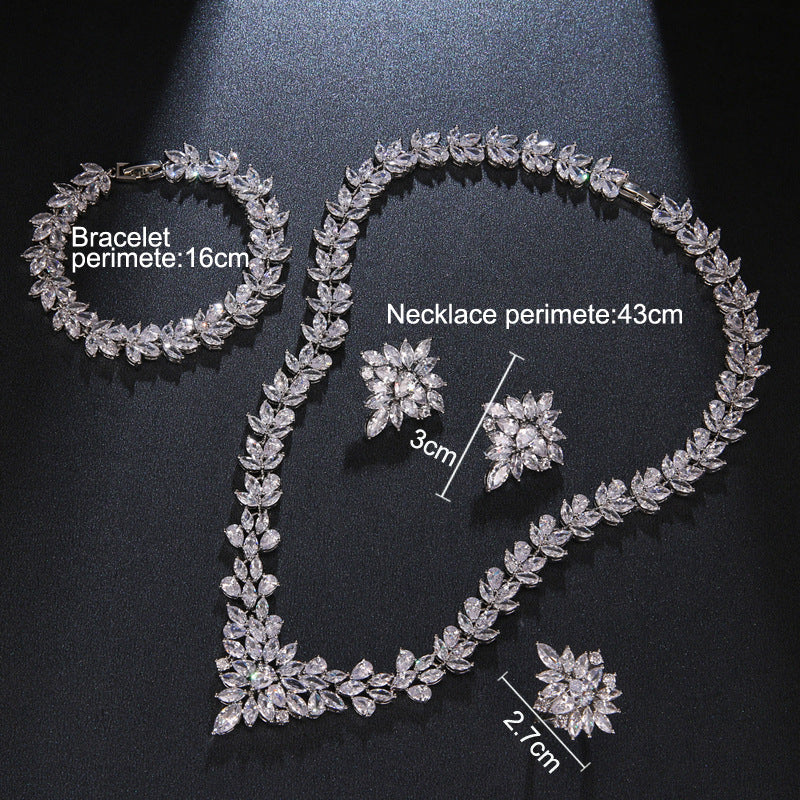 The Dazzling Set Is Handcrafted With Copper And Set With Zircon Stones. null