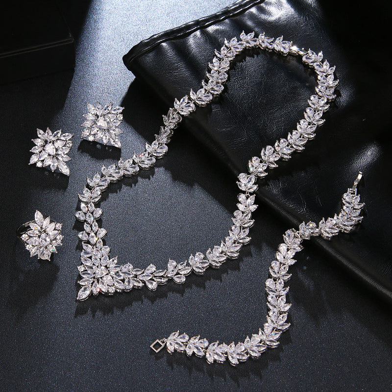 The Dazzling Set Is Handcrafted With Copper And Set With Zircon Stones. null