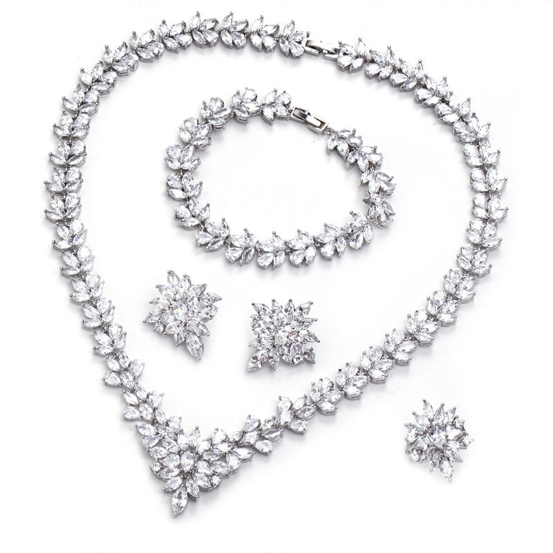 The Dazzling Set Is Handcrafted With Copper And Set With Zircon Stones. null