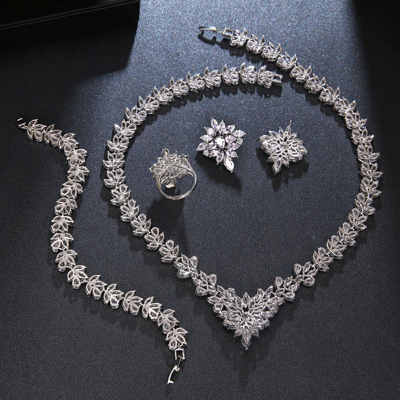 The Dazzling Set Is Handcrafted With Copper And Set With Zircon Stones. null