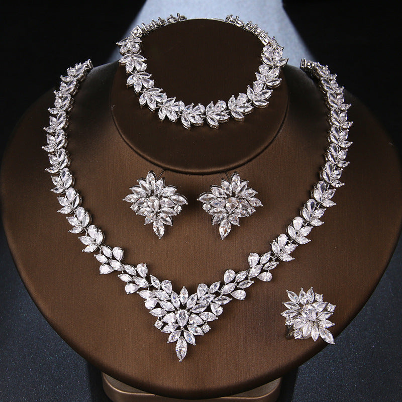 The Dazzling Set Is Handcrafted With Copper And Set With Zircon Stones. null